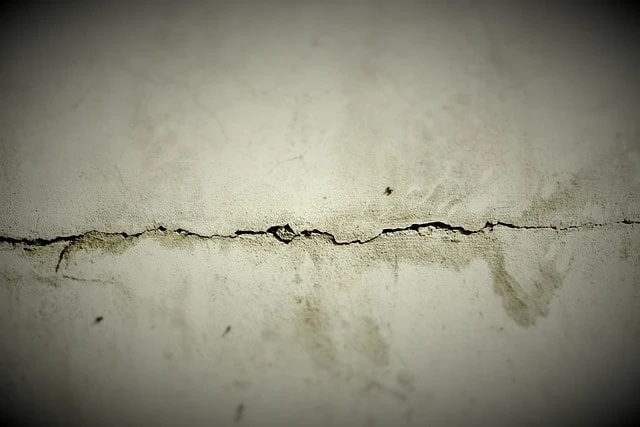 Horizontal crack in a white wall Horizontal crack in a white wall