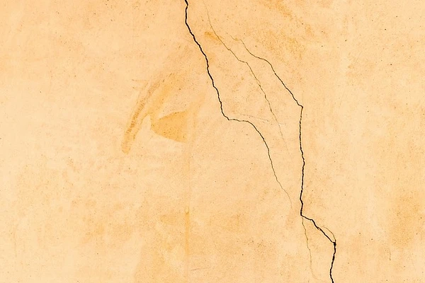 cracks on a concrete wall cracks on a concrete wall