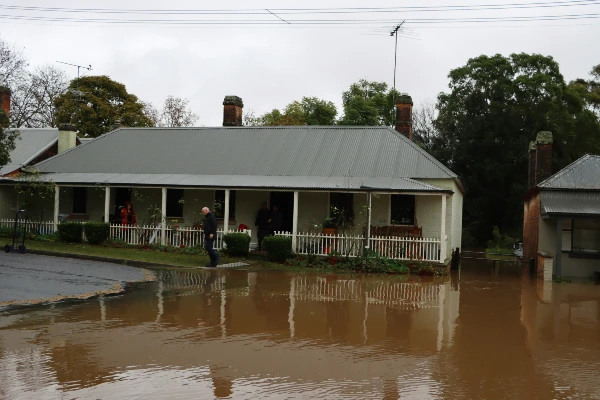 flooded house and street flooded house and street