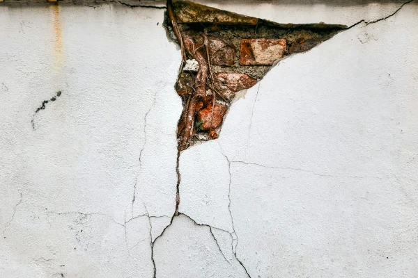 A crack in the side of a building A crack in the side of a building