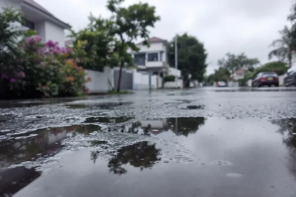 pooling water around a home’s foundation after heavy rainfall pooling water around a home's foundation after heavy rainfall