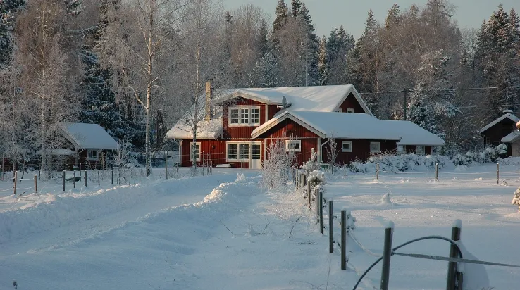 a pile of snow covering houses a pile of snow covering houses