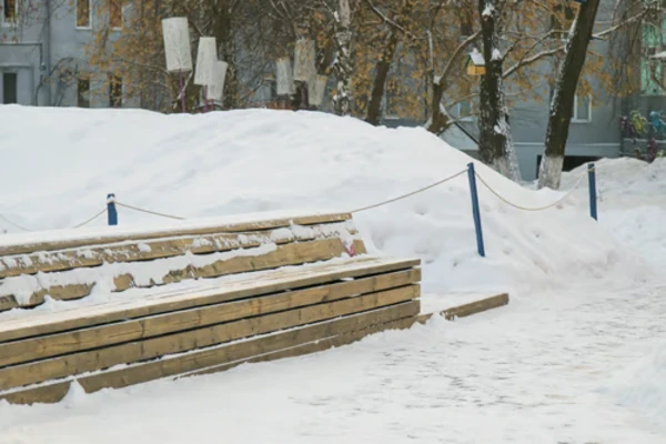 Bench in park with snow in winter season Bench in park with snow in winter season